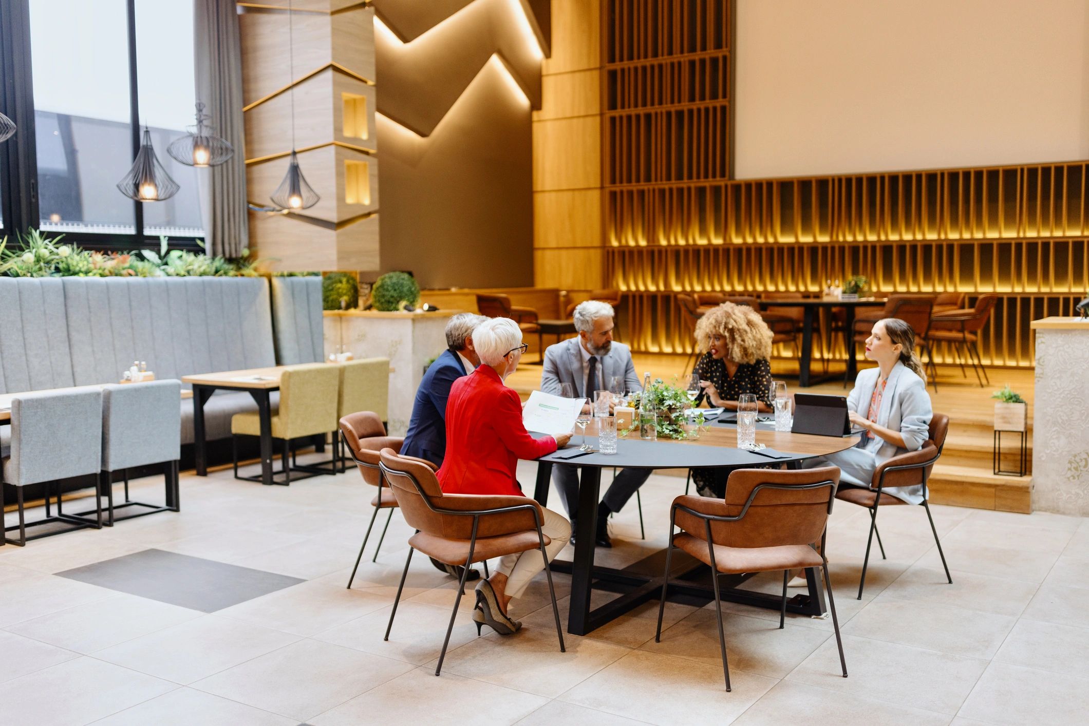 Business professionals meeting over lunch