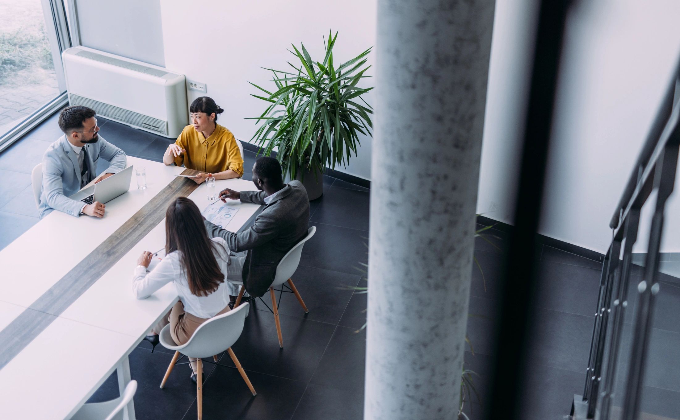 Business team reviewing financial plans together